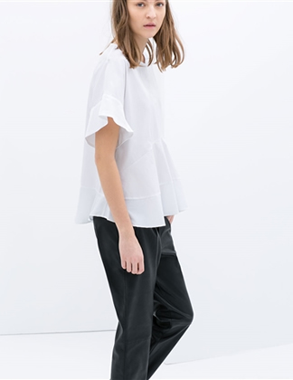 Blusa com costura e babados
